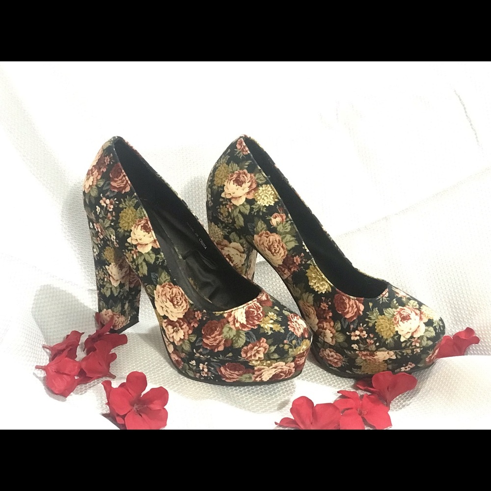 Women’s size 8 rose covered boots. Never worn.